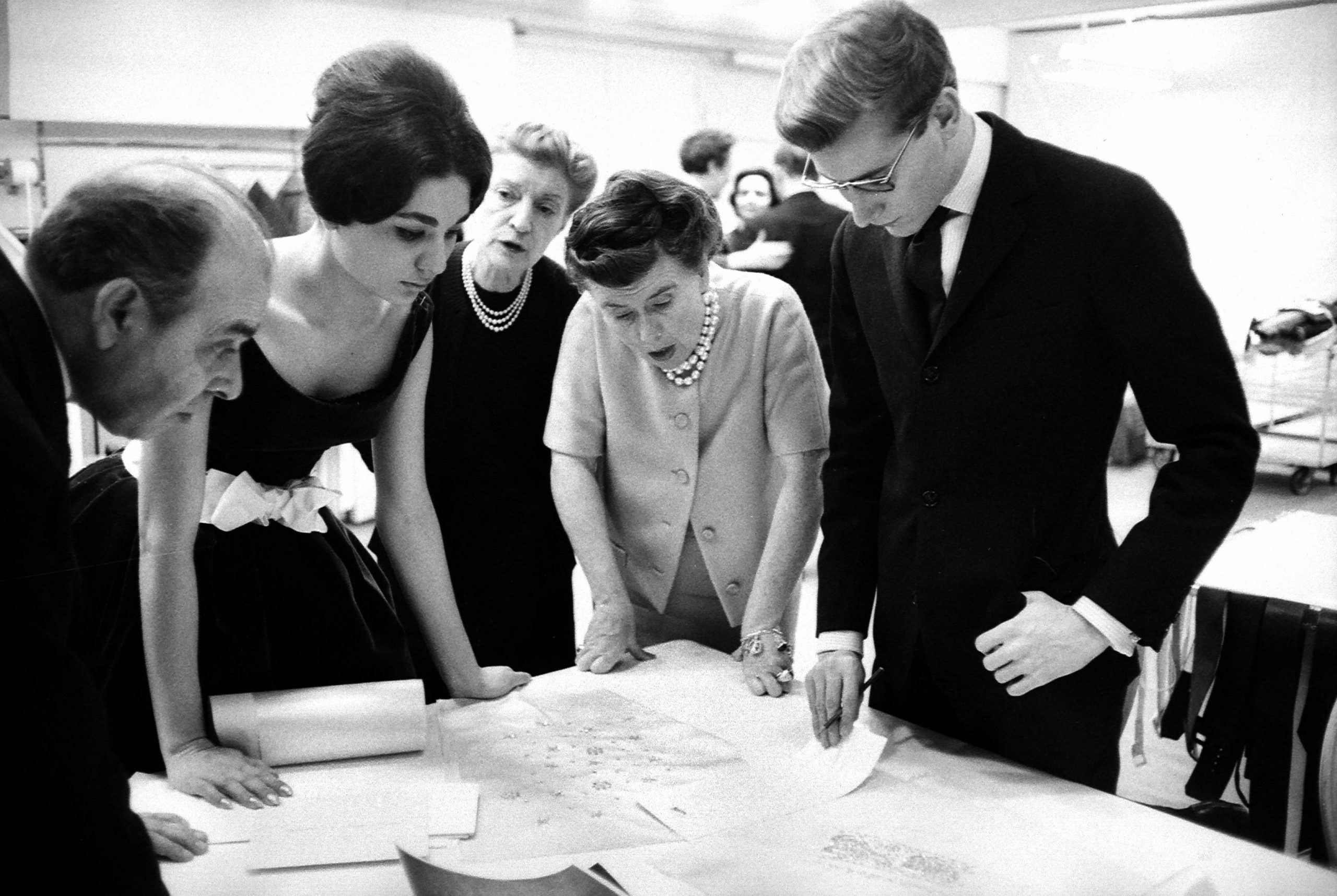 French fashion designer Yves Saint Laurent , at the House of Dior